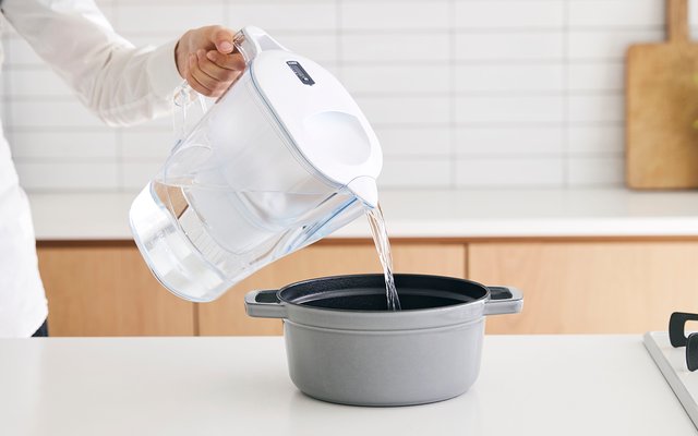 A water filter being adjusted